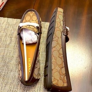 Coach loafers!  Cute, comfortable and simple.